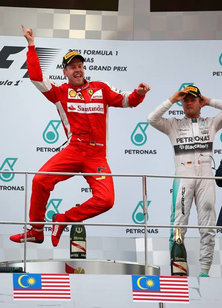 La gioia di Vettel sul podio per una vittoria della Ferrari (Getty)